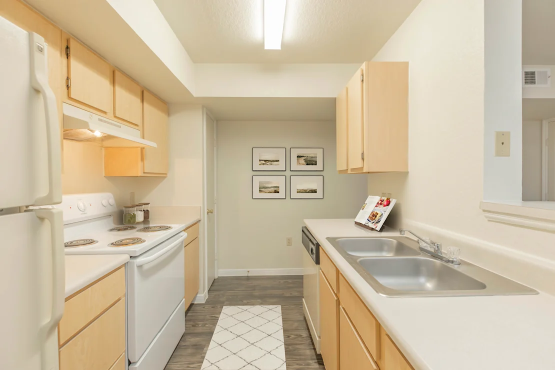 kitchen with white appliances  at Crosspoint Oaks at Boerne, Boerne, TX 78006