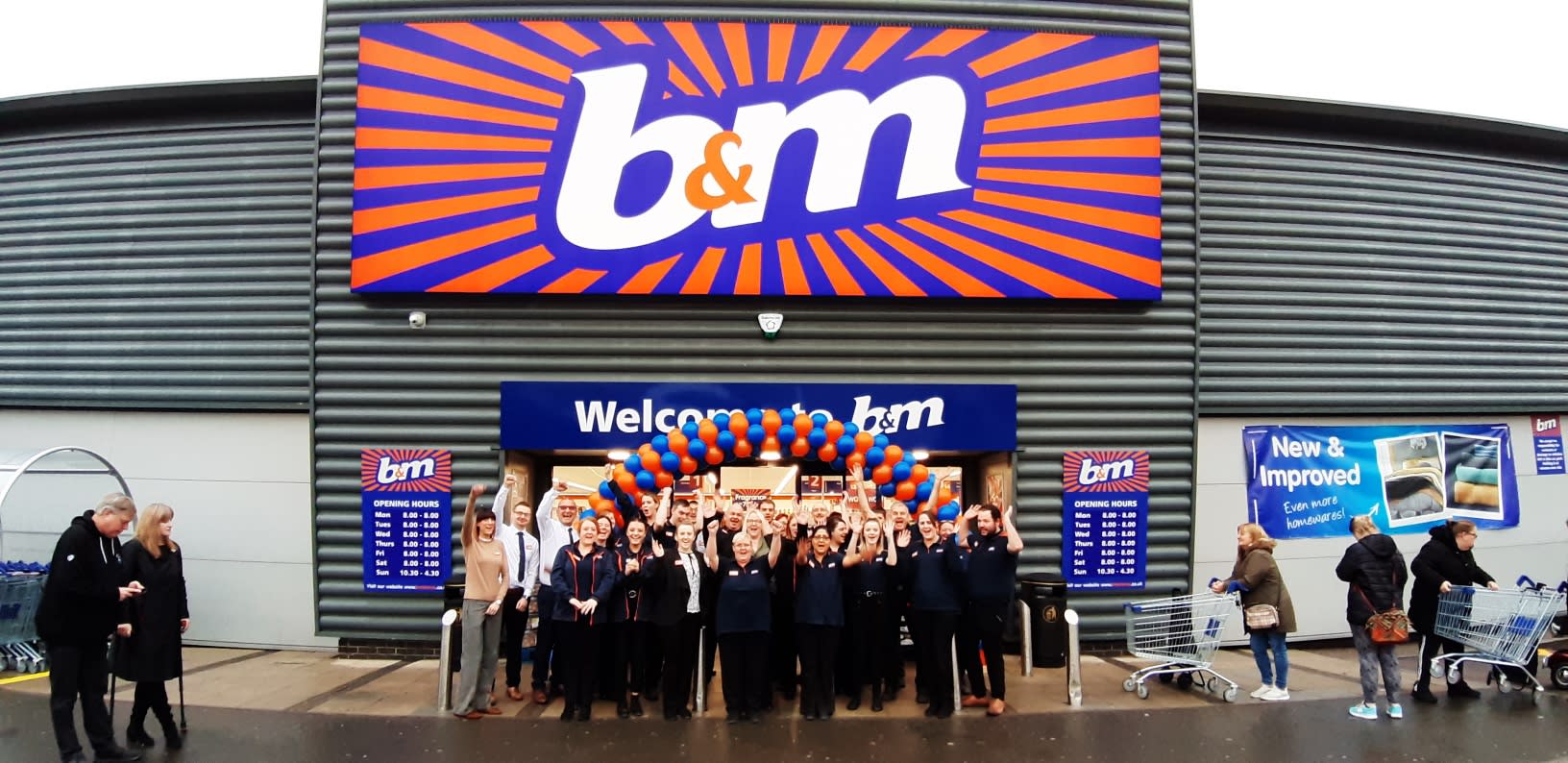 The store team at B&M's newly refurbished store in Derby pose in front of their wonderful new Home Store, located on Ascot Drive.