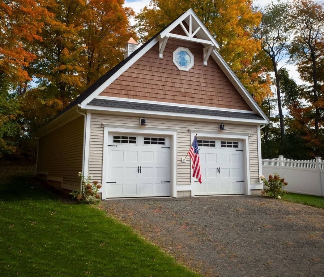 Carriage style garage door with windows and hardware