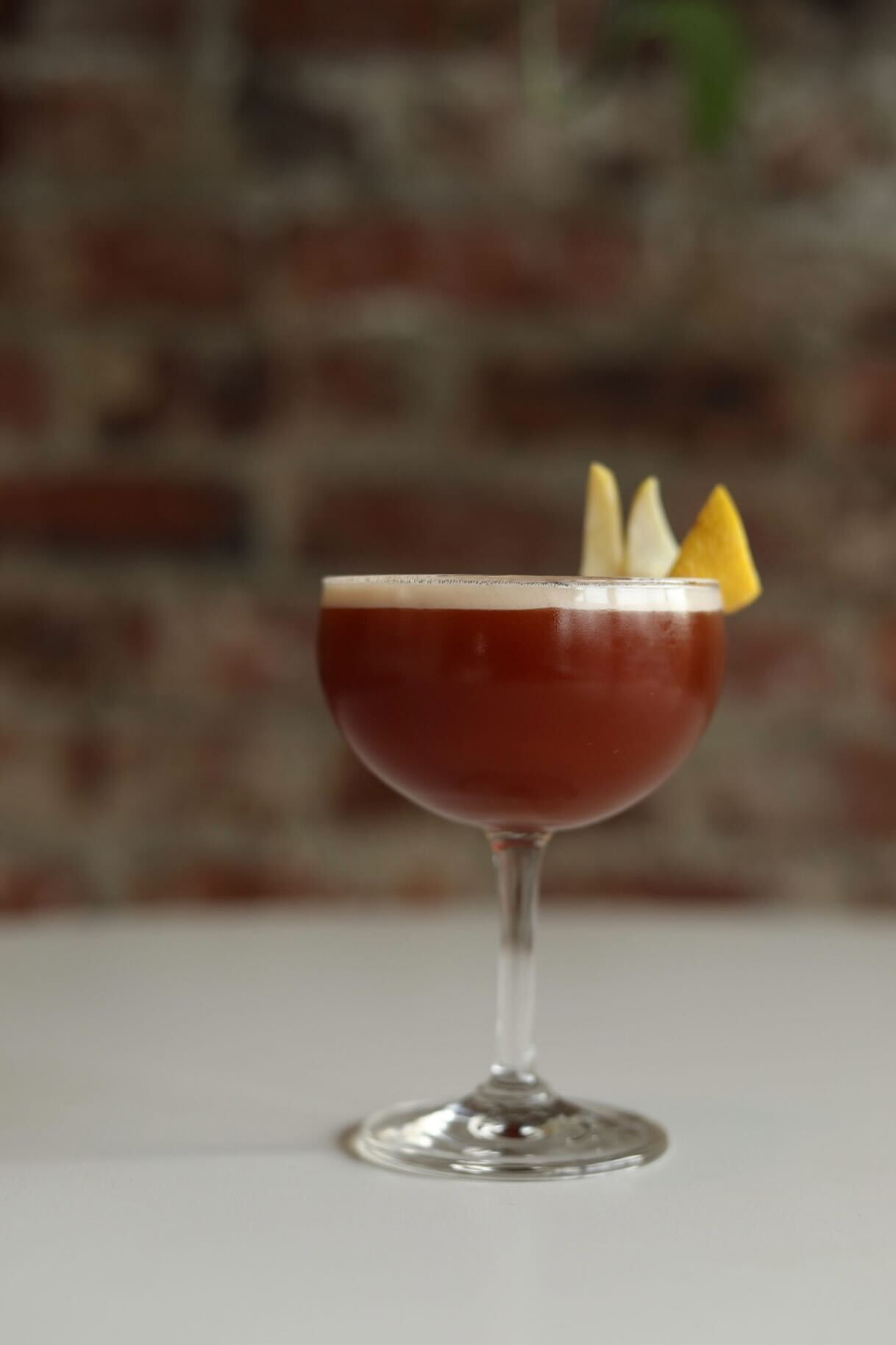 The bar at Folk during Apero Hour, the daily happy hour from 5 to 6 PM, on Meridian Street in East N 