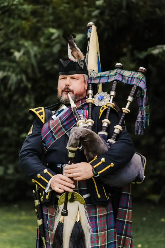 Images Andrew Paton Highland Bagpiper