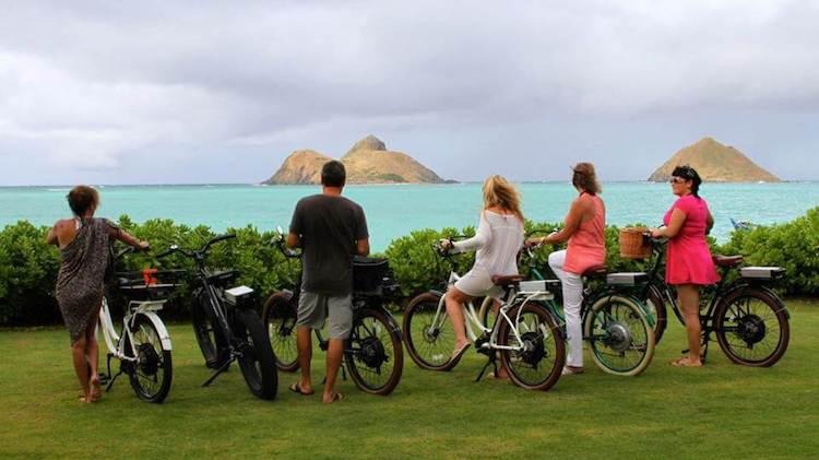 Riders taking a view of the beautiful waters of Oahu.