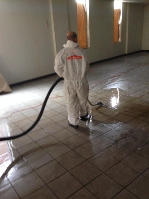 Our SERVPRO team in action extracting water.
