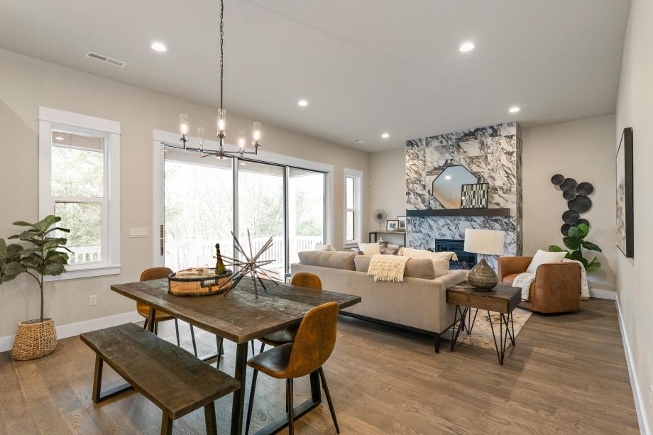 Light and bright main living level with greenspace views