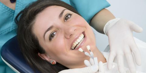 How Dental Implants Stay Put & Answers to Other Frequently Asked Questions