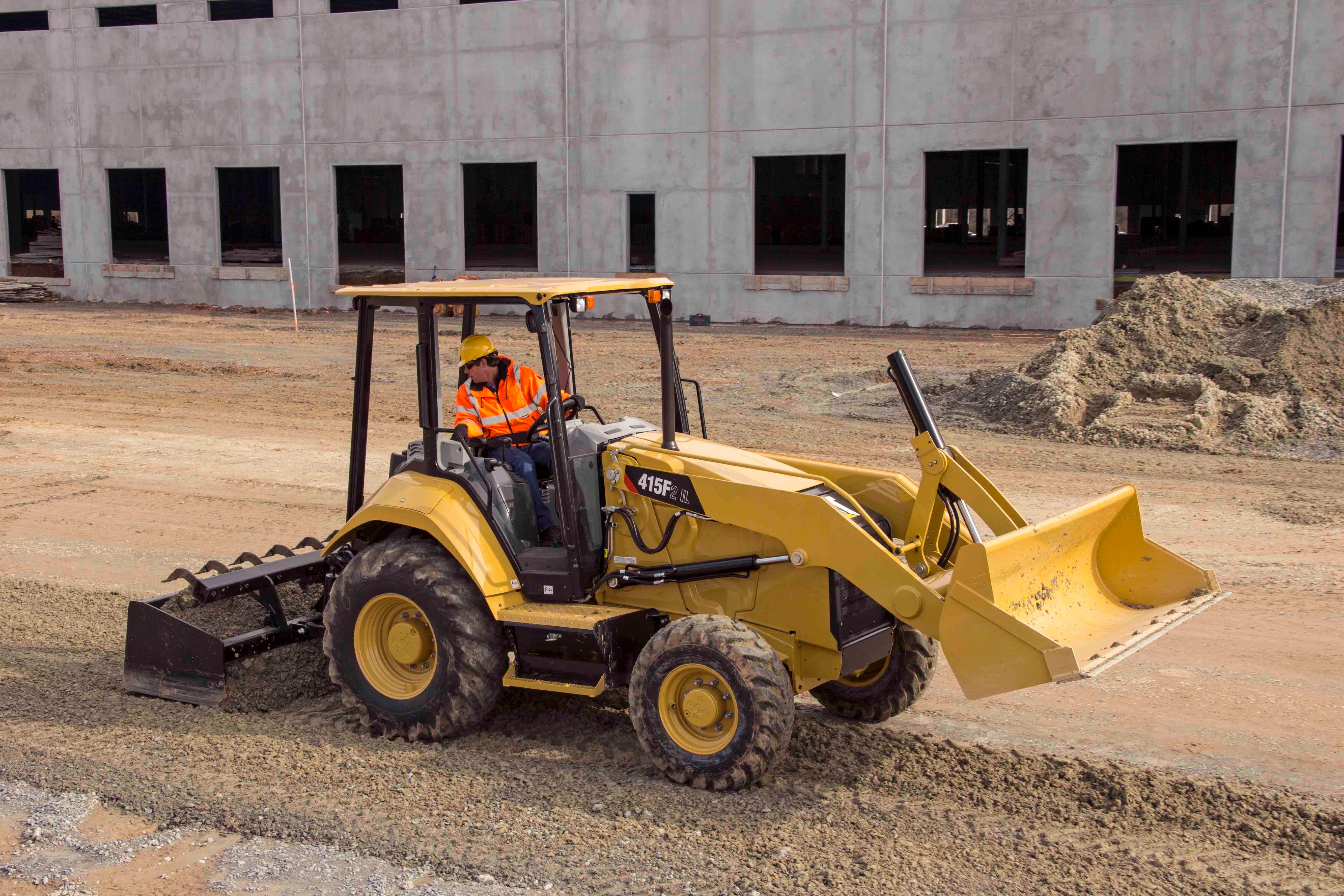 Экскаватор погрузчик sany bhl95. Cat 415f2. Экскаватор-погрузчик Caterpillar. Погрузчик сат 992к. Экскаватор Санни 415.