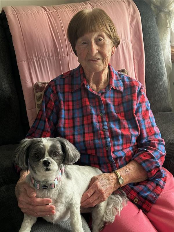 Older adult enjoying companionship and comfort at home with support from in-home care.