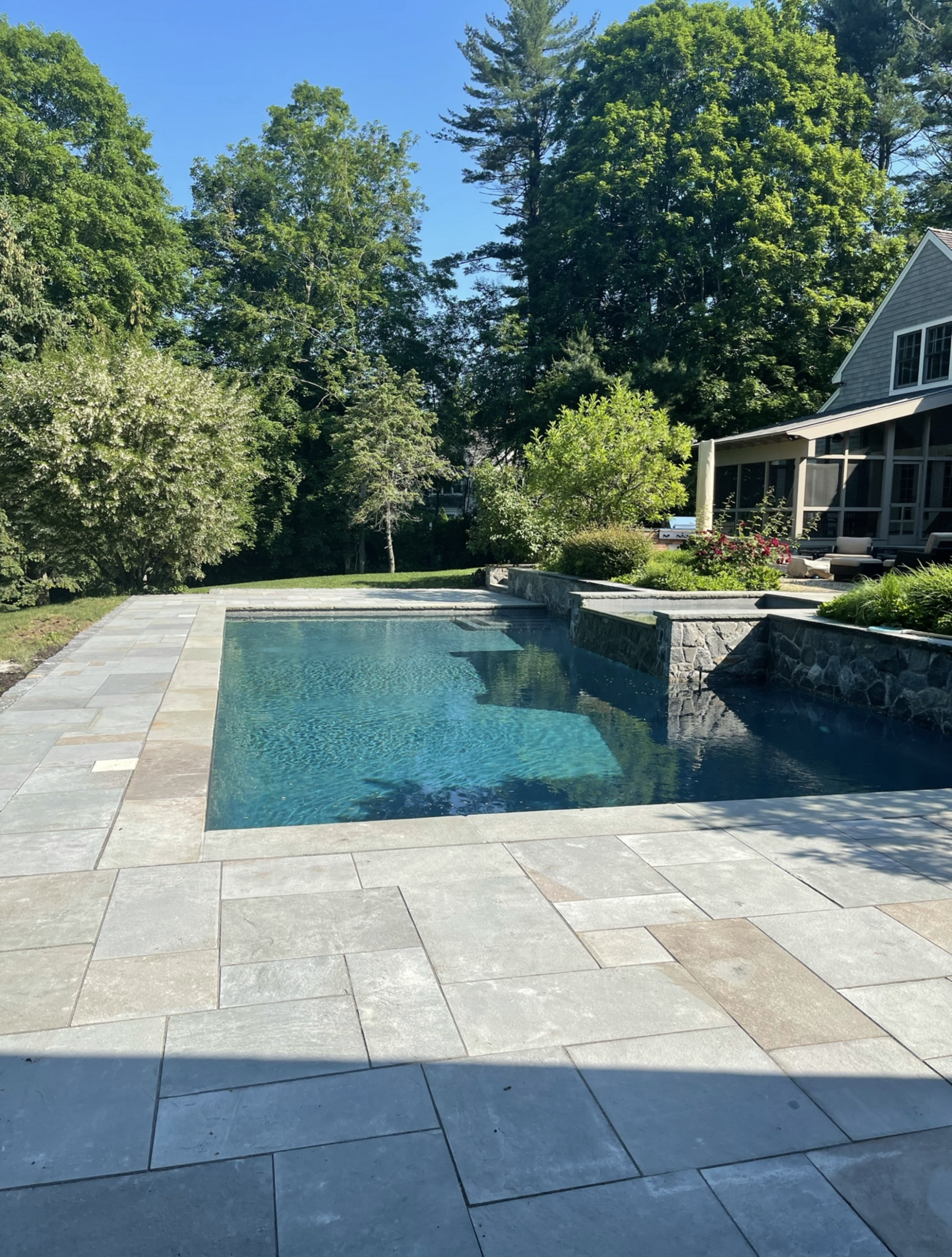 Bluestone pool deck - Paver Pool Decks project by General Masonry LLC.