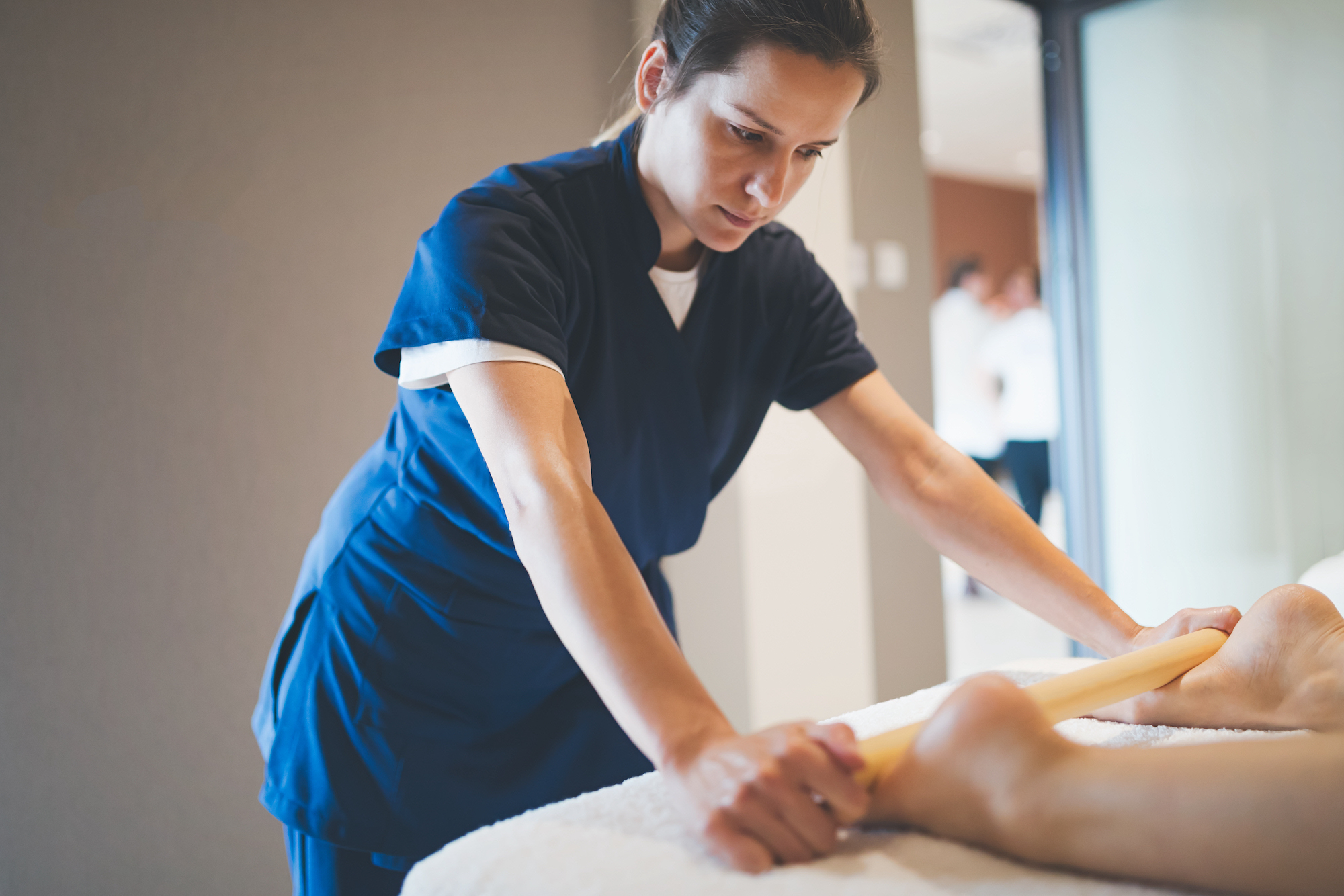 Patient during physical therapy in Logan