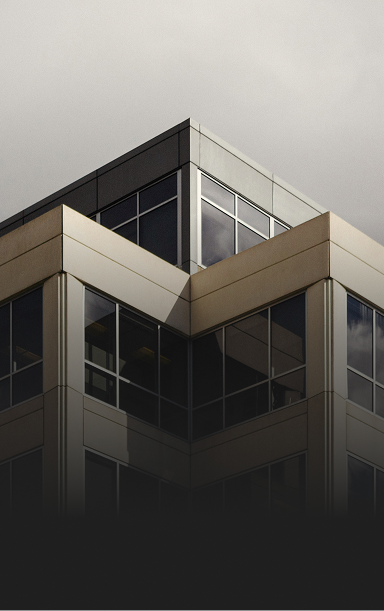 Exterior view of an angular office building.