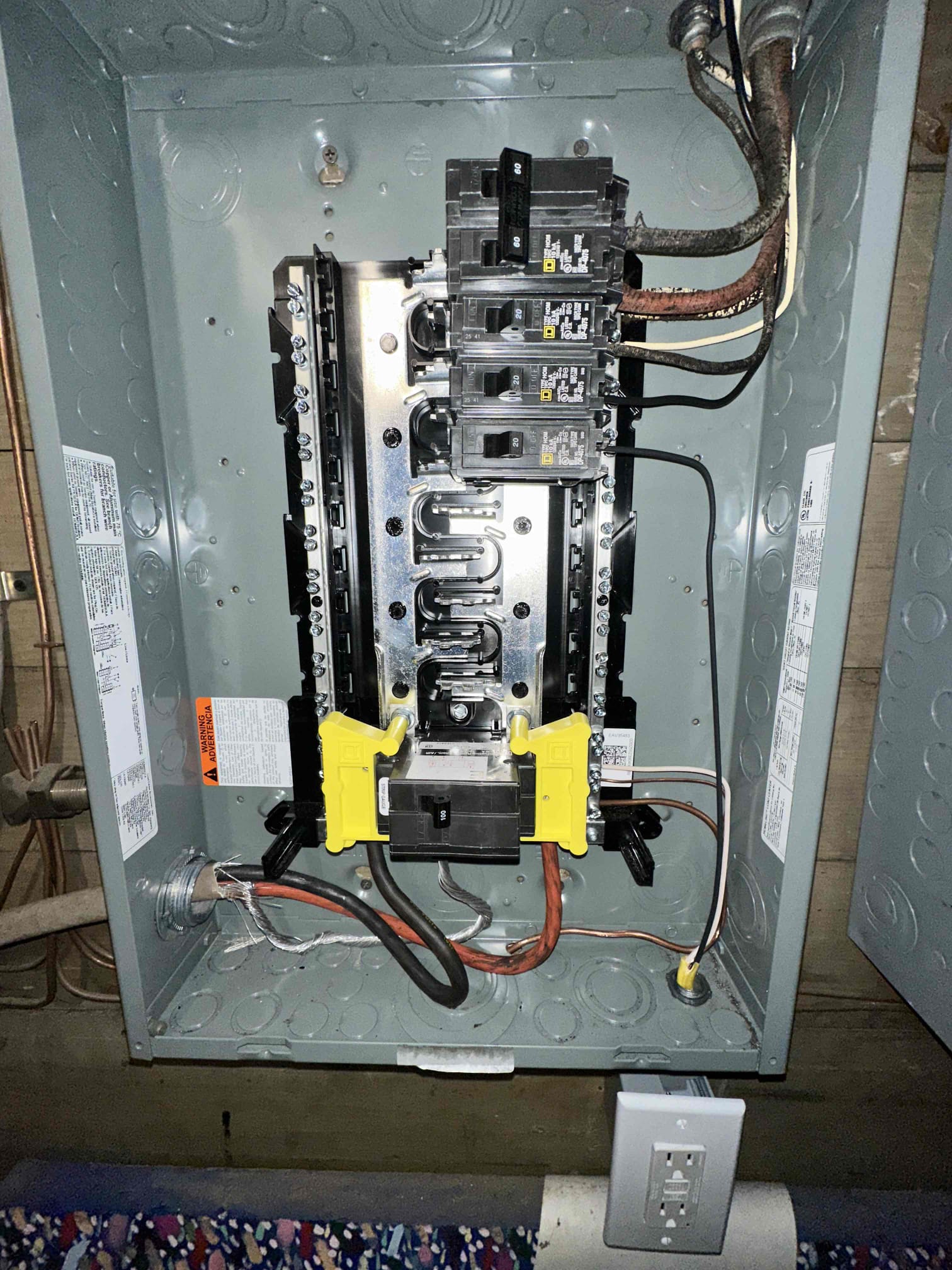 Thomas Edison Electric installed this Square D 100-amp subpanel in a Reading, PA home. The panel features a QO main breaker with yellow handle ties and has room for additional circuits as the homeowner's needs grow.