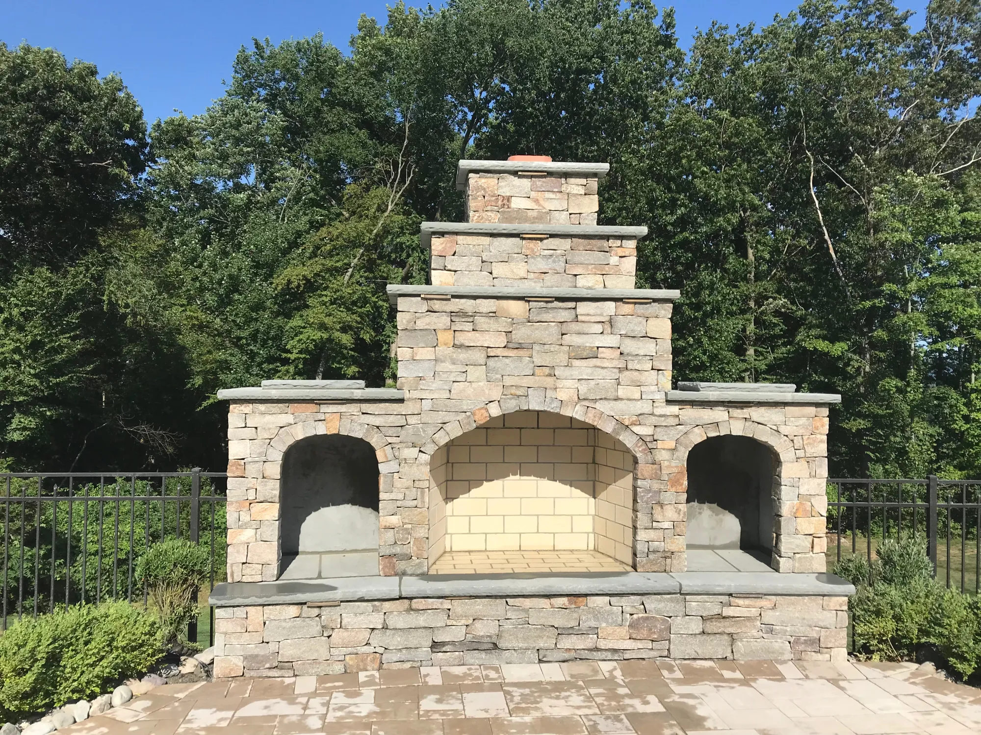 Custom stone fireplace - Fireplaces project by General Masonry LLC.