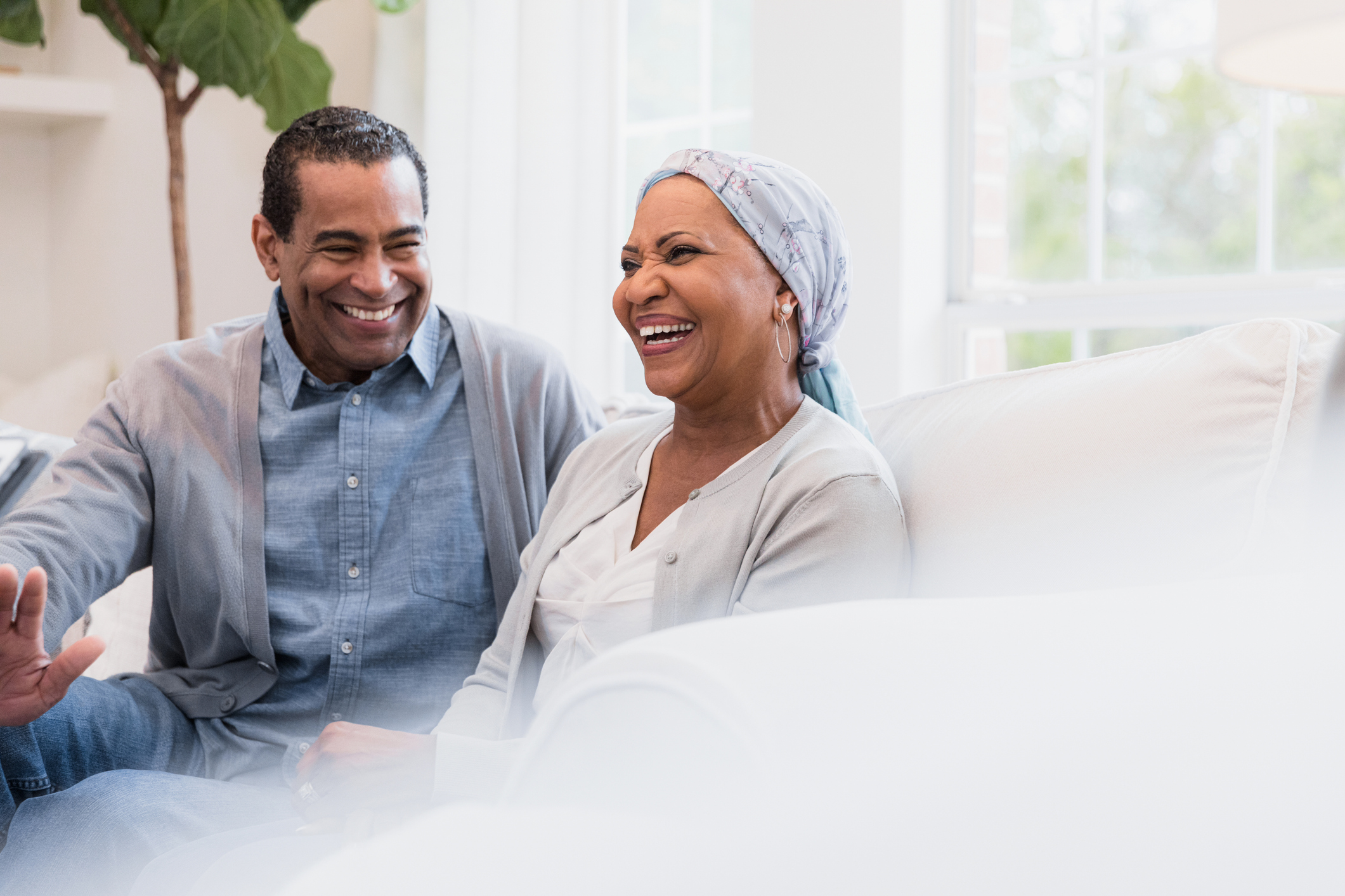 Happy couple in doctor's office