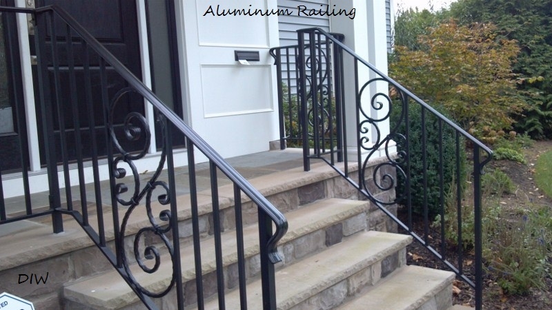 Aluminum Railing with straight ballusters, decorative scroll insert and lambs tongue end