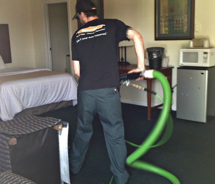 Dirty, dingy, stained carpets can ruin a first impression.  At SERVPRO of Hampshire County, we are cleaning specialists.  Whether it&#39;s a fire, water damage, mold, air ducts, general cleaning or carpet cleaning, we&#39;ve got it covered.  In this picture, our trained technician uses hot water extraction to clean carpets in a Berkshire motel.  With the use of our truck mount, our technicians get a deeper, longer lasting clean which is far more effective than a less powerful unit.