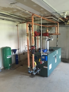 Commercial boiler and piping system installed by BC Ten Air in Milford, MI