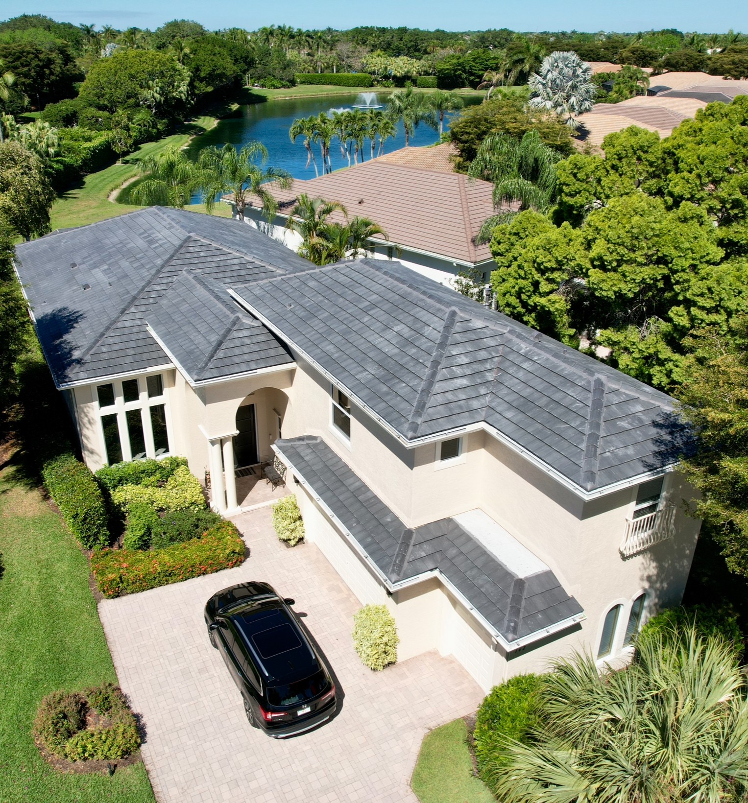 We replaced this roof and installed a flat tile from Eagle. This tile color is called Dark Charcoal.