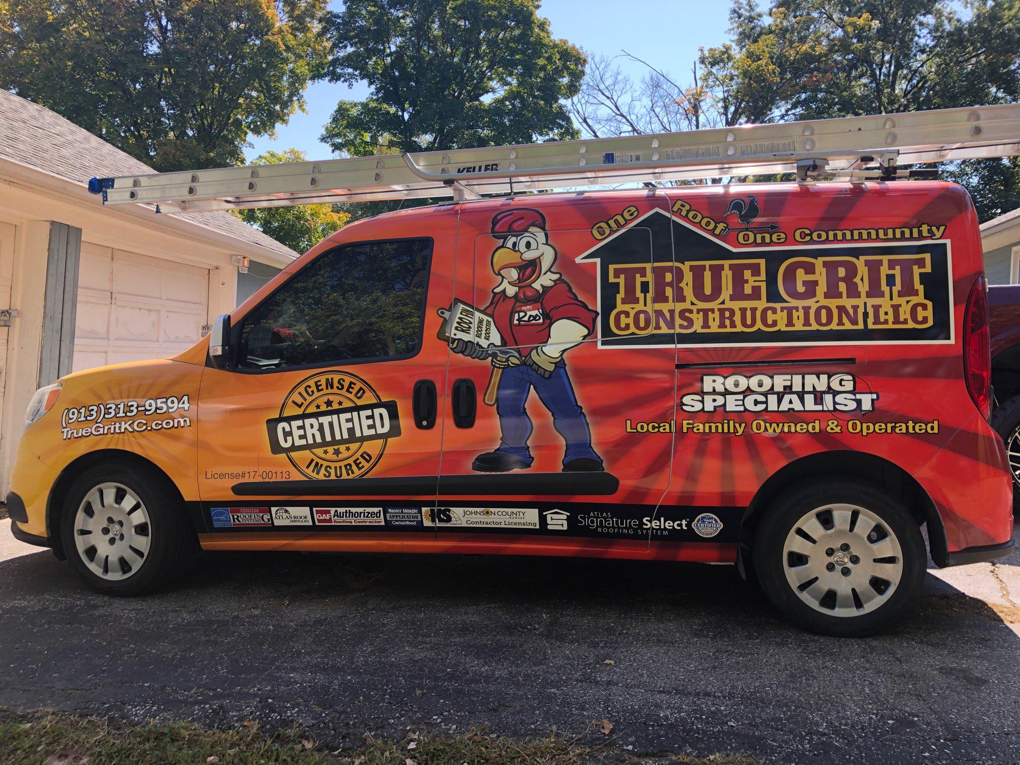 Left Side of True Grit Roofing Company Wrapped Van