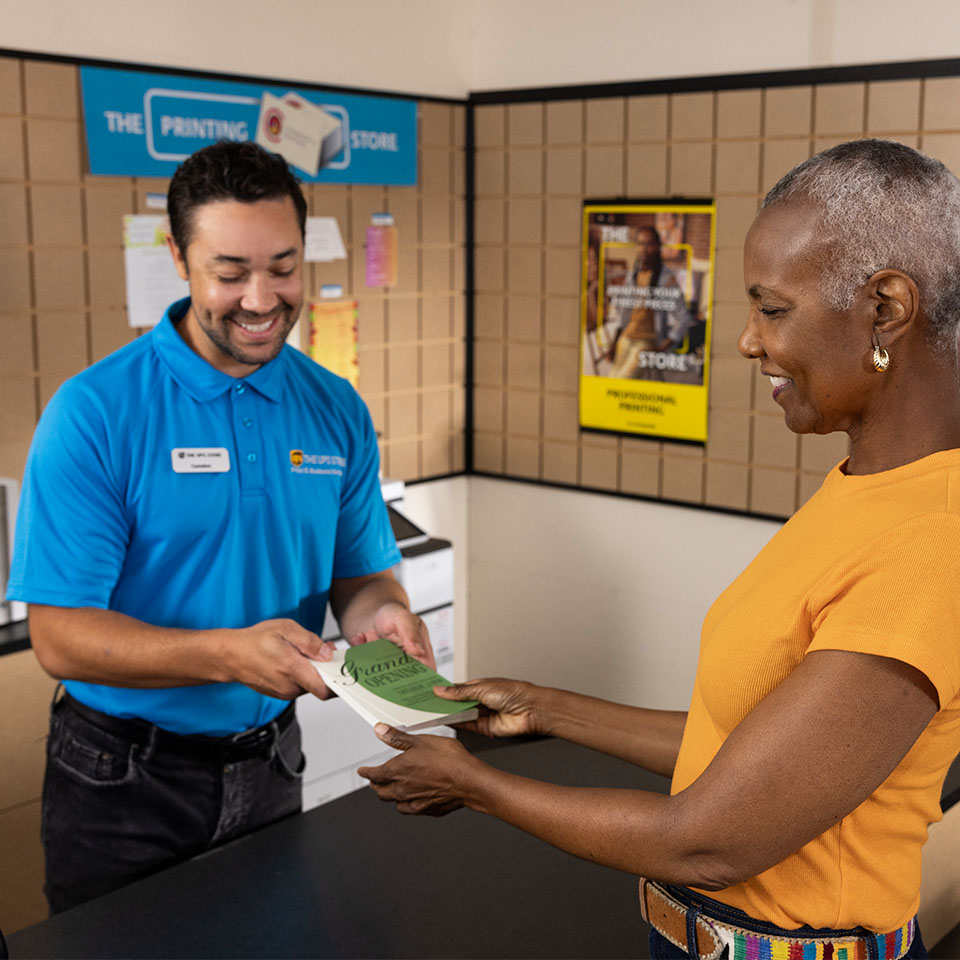 UPS Store Associate assisting customer
