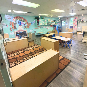 Bright and colorful preschool classroom at Childcare Network with age-appropriate learning materials