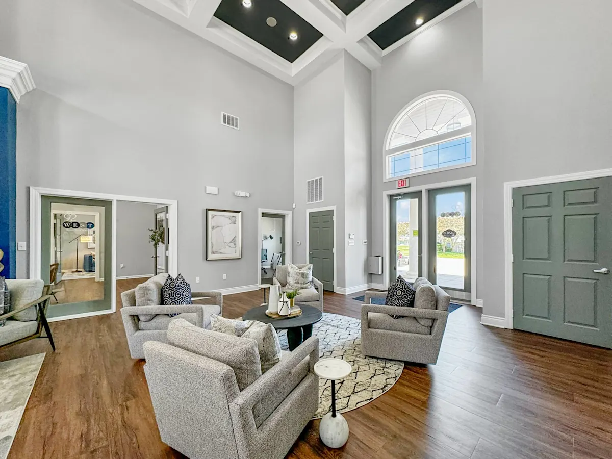 a living room with couches and a table