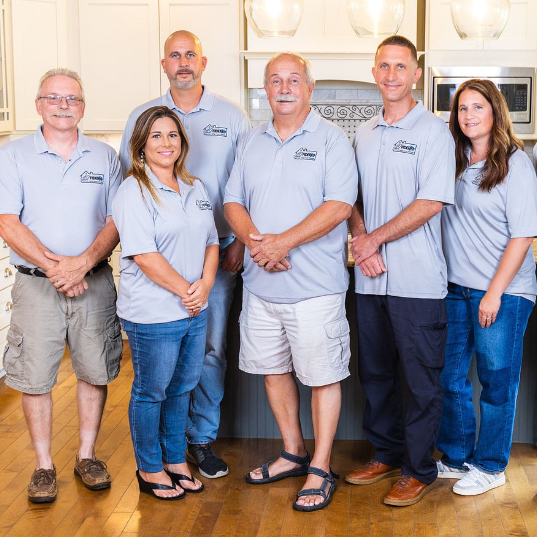 Fiderio’s experienced team of contractors and client liaisons stand proudly together.