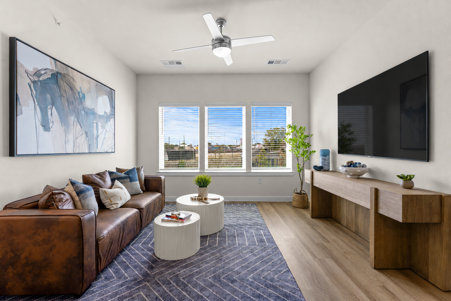 Two-bedroom living room at Cyrus Apartments off Ed Bluestein Blvd. 