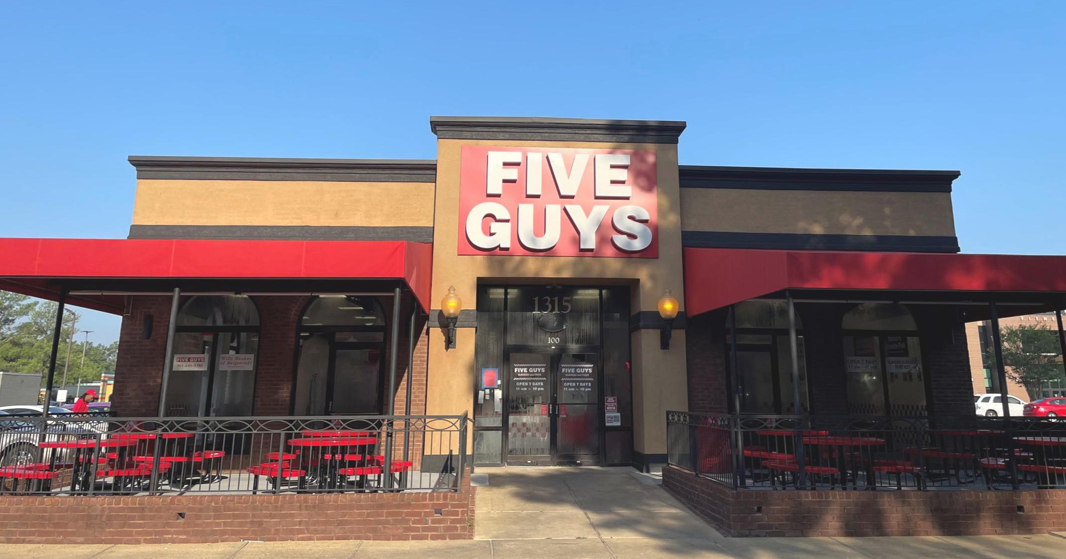 Exterior photograph of the entrance to the Five Guys restaurant at 1315 Ridgeway Road in Memphis, Tennessee.
