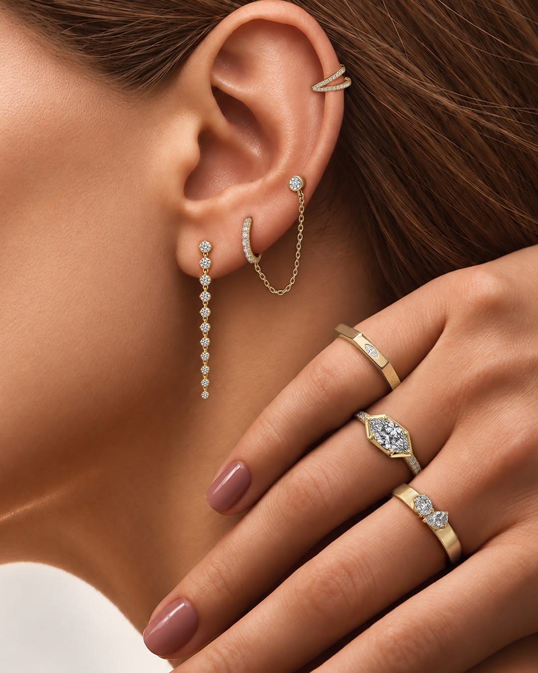 Occupancy: 100% stacked at Piper Diamond Co. / Custom Jewelry Studio! Discover a curated look of sparkling earrings, a delicate ear chain and rings that bring personality to every layer of your style.