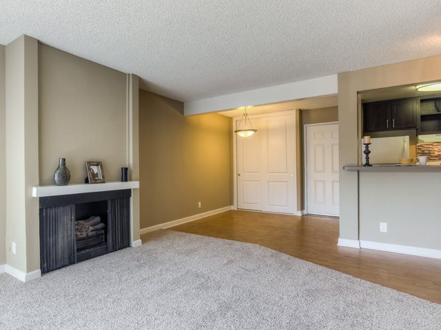 Open Living Room with Fire Place Cornerstone Apartments Canoga Park (747)239-5299