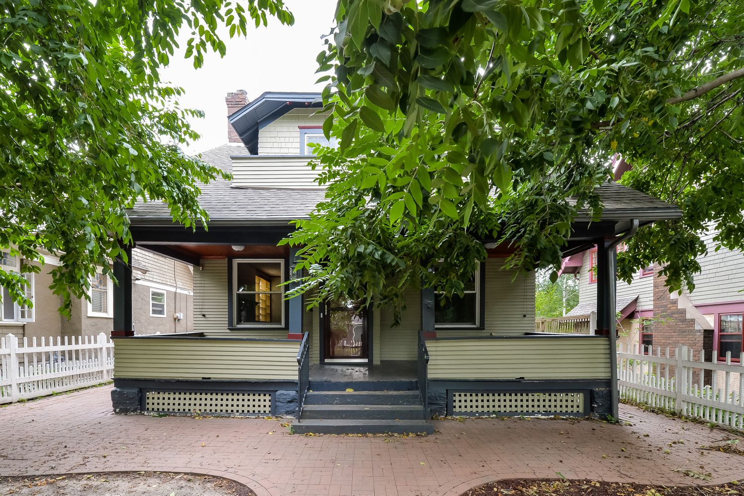 Charming home with a large front porch at Invitation Homes Minneapolis.