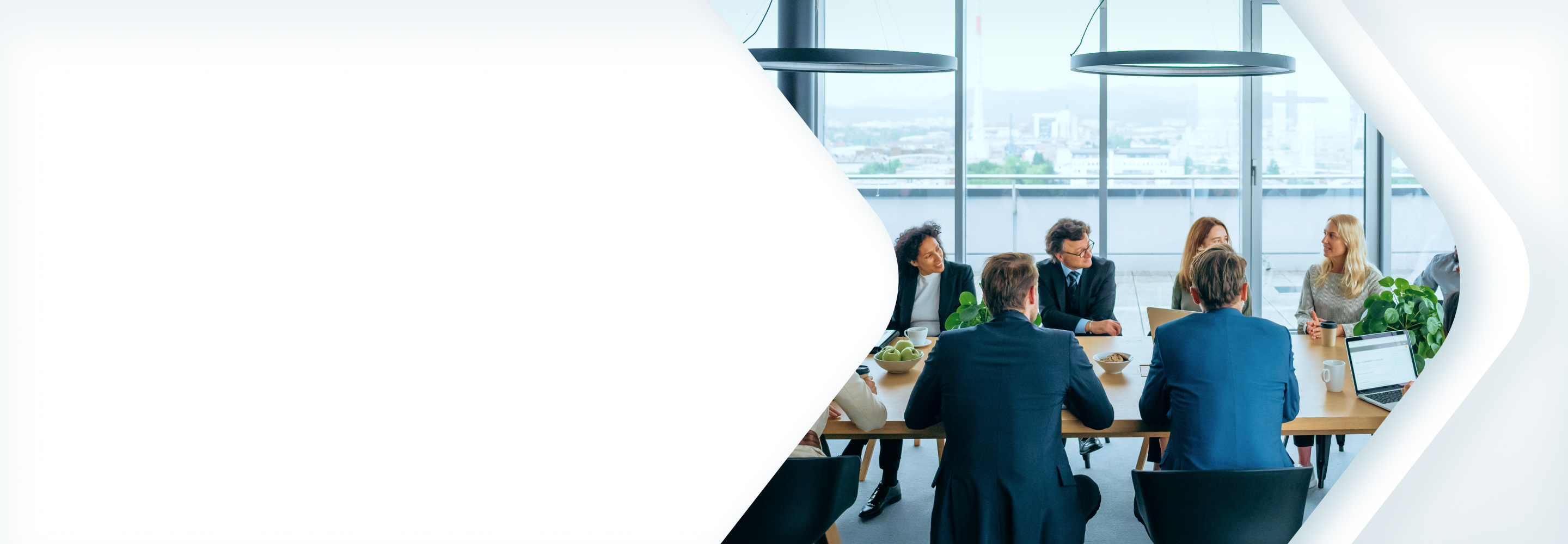 A group of wealth professionals collaborating at a conference table.