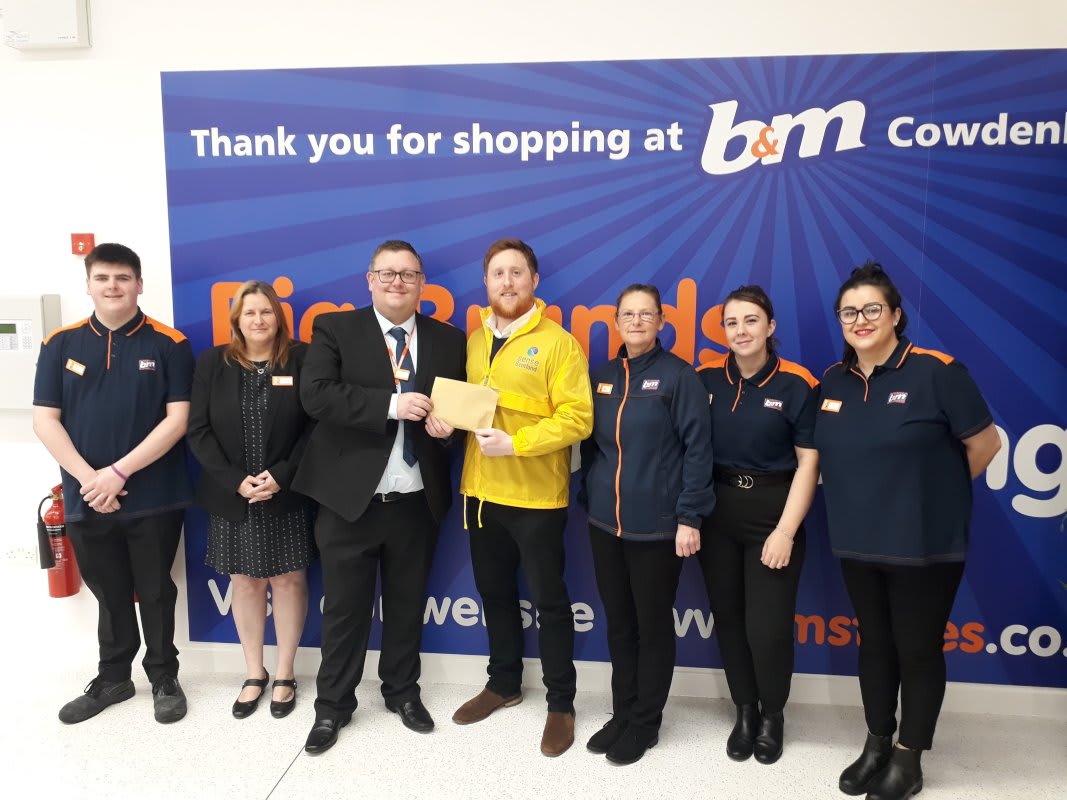 Store staff at B&M's new store in Cowdenbeath were delighted to welcome Kris Kennedy from local charity, from local charity Sense Scotland , the store's chosen charity for opening day. The charity received £250 worth of B&M vouchers in appreciation of the