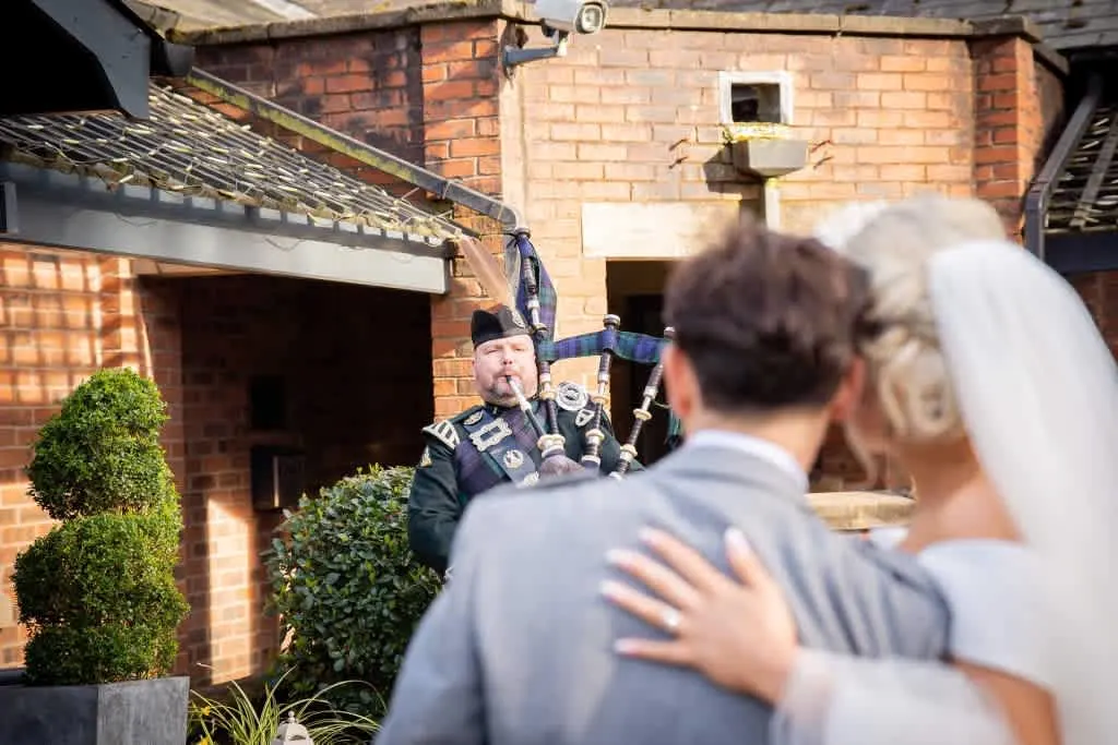 Images Andrew Paton Highland Bagpiper