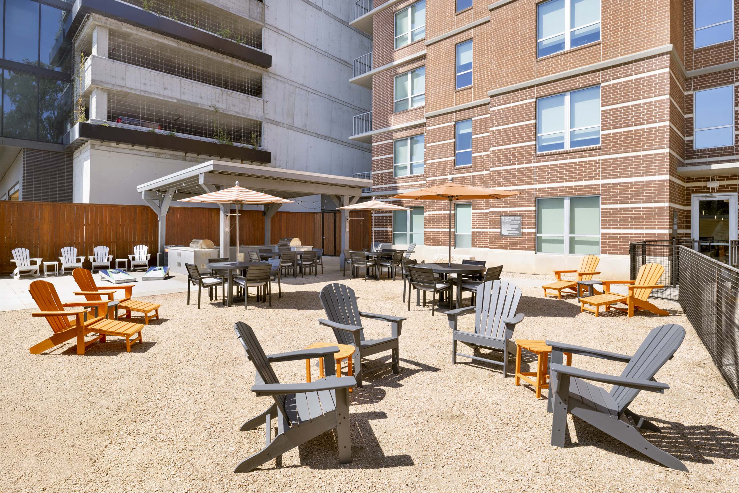 Backyard resident lounge with grills at Camden Rainey Street apartments in Austin, TX