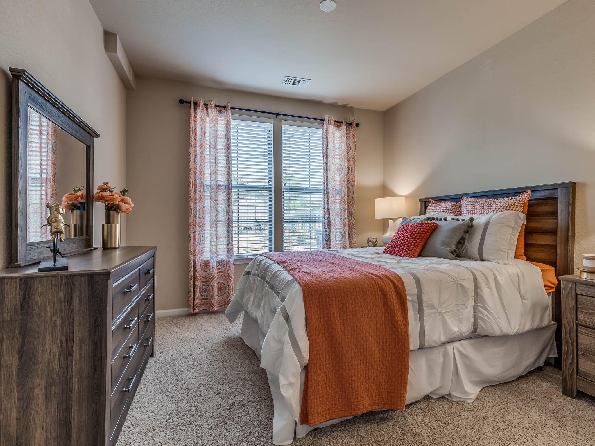 Carpeted Bedroom with Tall Ceilings