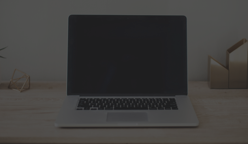 An open laptop on a desk.