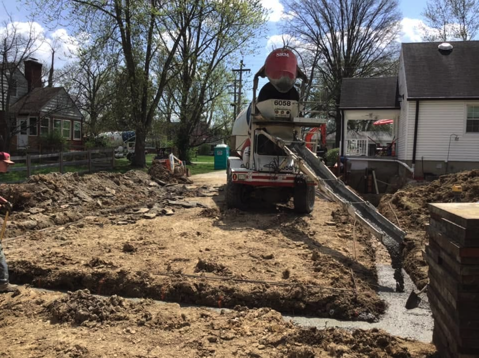 This is what it looks like when you pour a footer. It is the foundation of your building. If it is not done right, you can have all kinds of problems down the road. That's our specialty. We do things right the first time. When we build, we want our home additions and garages to last. Do you have a project in mind for your home this summer? Call us today to discuss it.