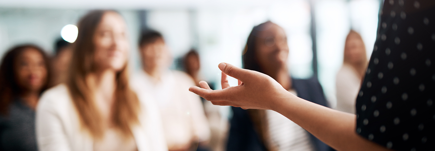 A speaker giving a presentation to an audience.
