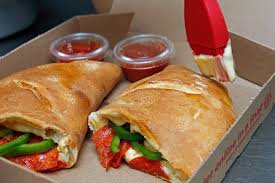 Enjoy a Snappy Tomato Pizza – Lunch, Dinner or Evening Snack
Delivery, Pick-Up or Carry-Out
Calzone - YUM!
