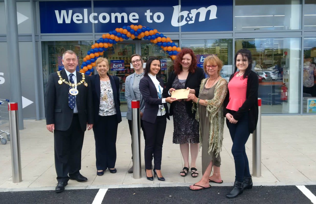Local Mayor, David Wildey and his wife Denise pose with special guests Strood Community Project. The charity were invited to help open the store and received £250 worth of B&M vouchers as a thank you.