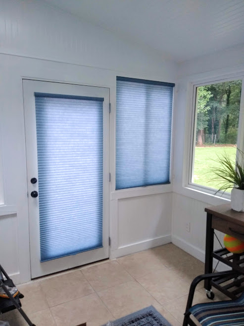Cellular Shades Blue: What’s the best window covering to help you beat the heat this summer? Cellular shades (also known as honeycomb shades) are designed to keep the heat out while letting light in.  This customer wanted to enjoy her sunroom but one side received a brutal amount of sun during the a