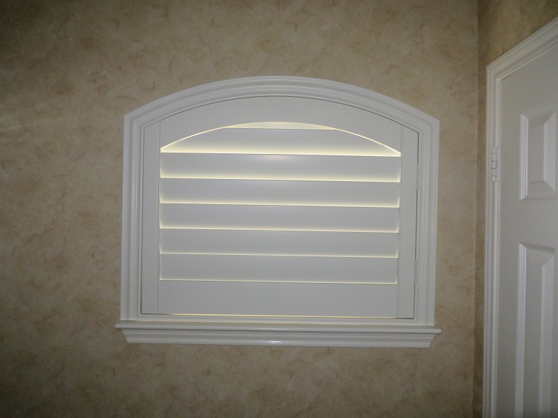 Compliment and accentuate the arched windows of any unique shape or size in your home with Shutters by Budget Blinds of Katy and Sugar Land!