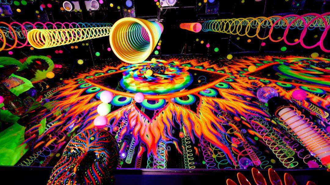 Wink World - it’s an infinity Portal to other dimensions. A combination of Visionary Art, Blacklight, Motion, Kinetic Art, Music, Love, and Theatrical-Spirituality in one place.