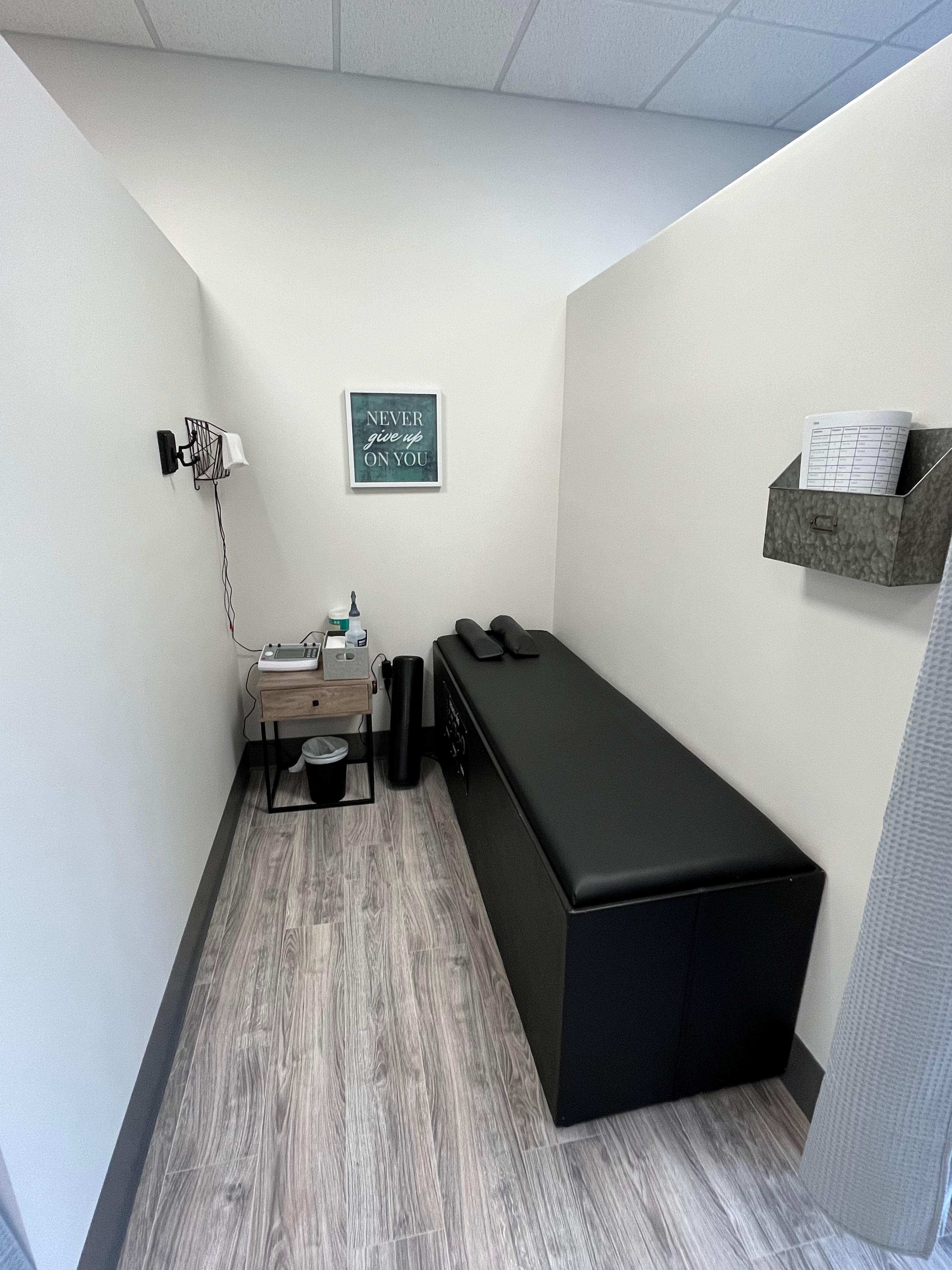 Private therapy suite complete with electrical muscle stimulation and intersegmental traction.