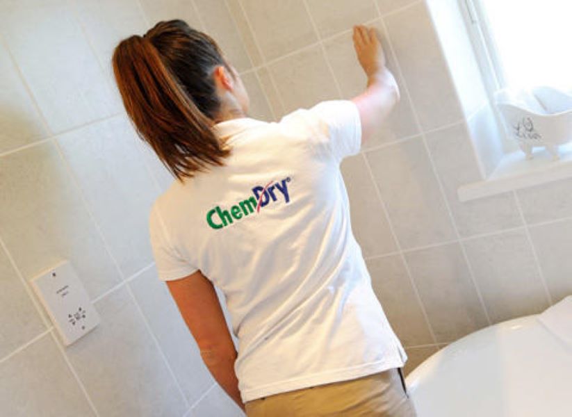 Chem-Dry technician performing tile and stone cleaning Chem-Dry of Seattle Seattle (206)783-1003