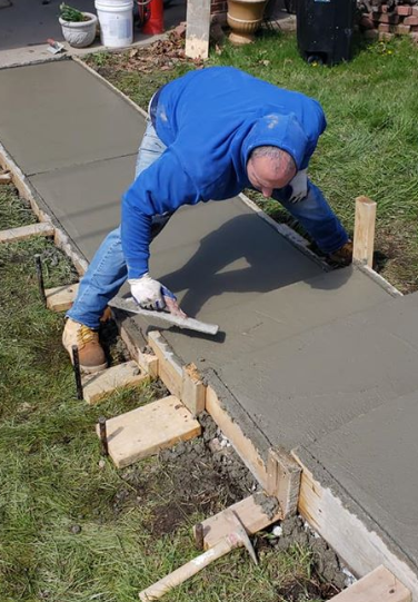 Finishing Touches on a New Sidewalk