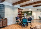 Residents gather in the Bistro at One Lincoln Park, enjoying casual dining and meaningful conversation in a welcoming community setting.