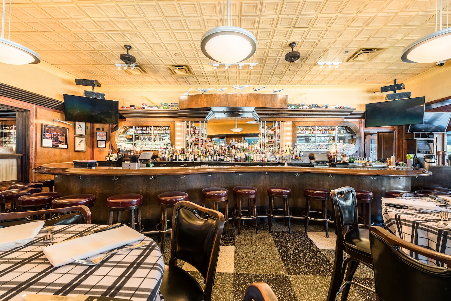 The bar at Gibsons Bar & Steakhouse in Chicago is a sophisticated and lively destination, serving as 