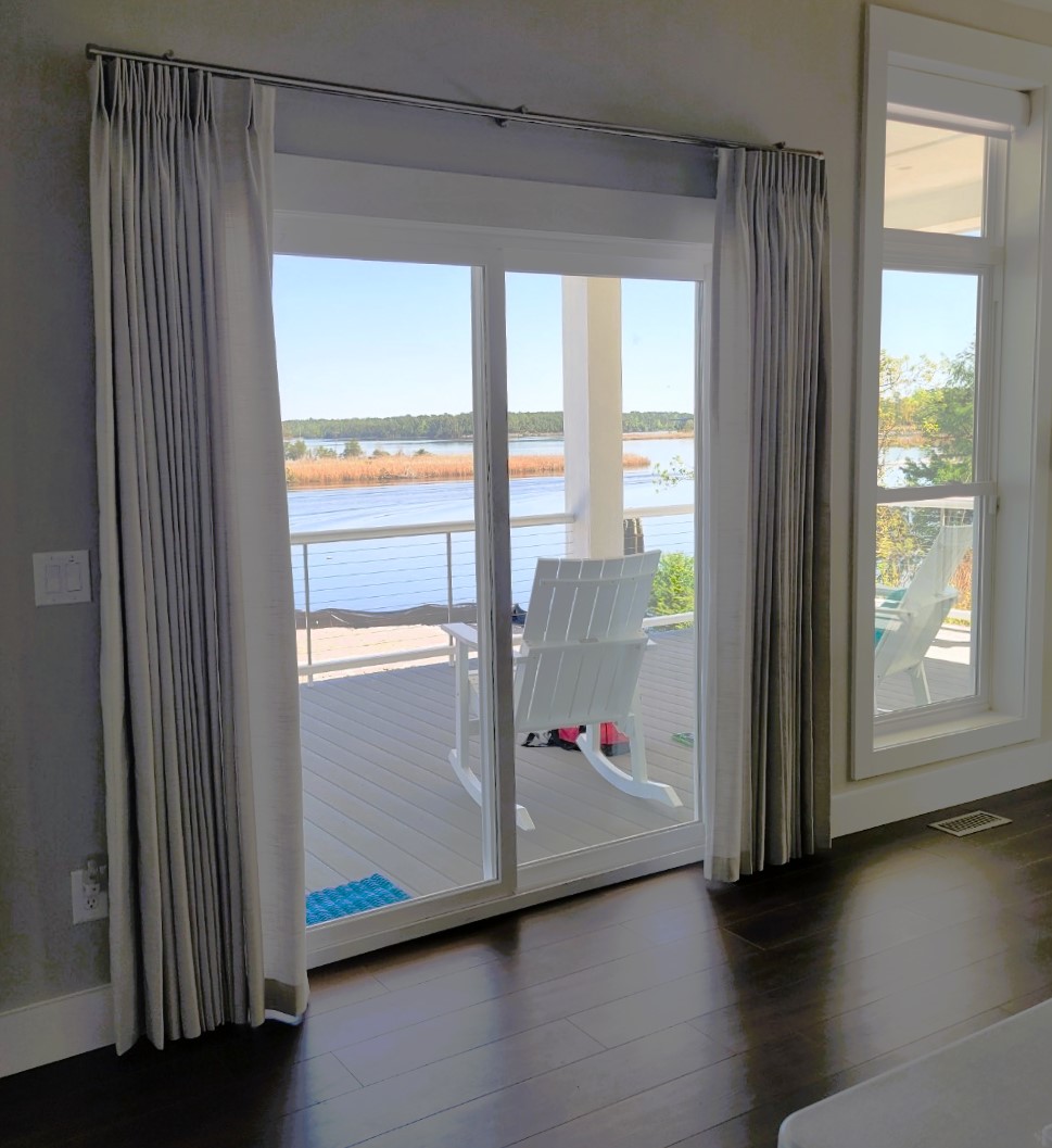 Our Vadain Drapery adds a touch of elegance to your patio doors in Jacksonville that overlook the breathtaking beach. Let the beauty of the outdoors seamlessly merge with your indoor space, creating a haven of relaxation and awe-inspiring views.